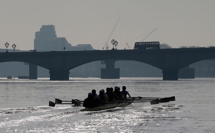 The Oxford University rowing crew train near Putney Bridge