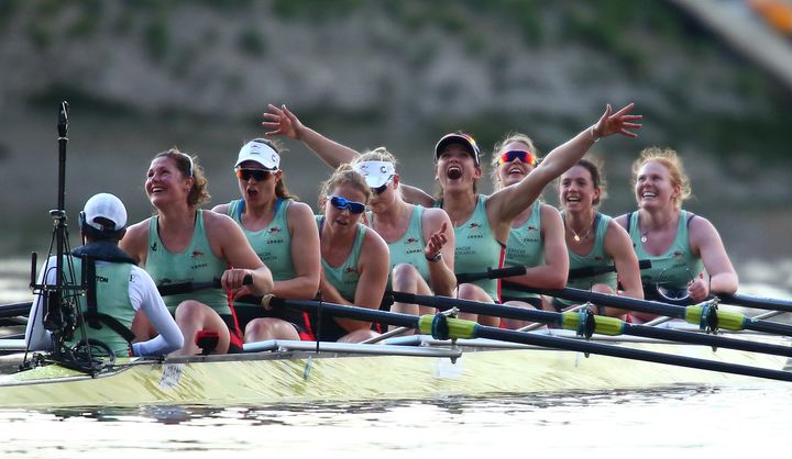 The Cambridge women's crew celebrate winning.
