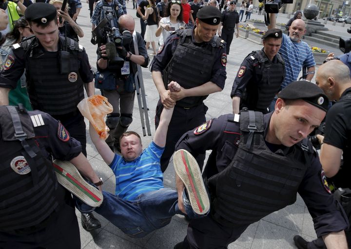 Chechnya's leader claims there are no gay people in the Russian region. A gay rights activist is seen being detained by police during an LGBT community rally in Moscow in 2015.