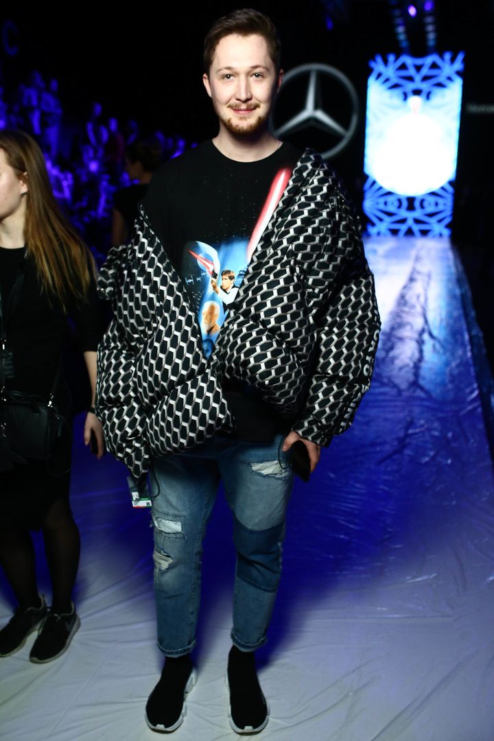 Saint-Tokyo designer Yury Pitenin on the fifth day of MBFW Russia, wearing Saint-Tokyo puffer jacket