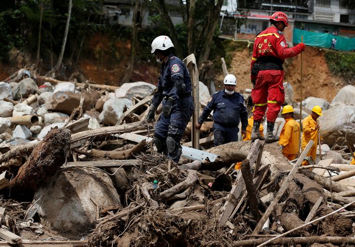 First responders look for the missing after flooding and mudslides hit Mocoa, Colombia.