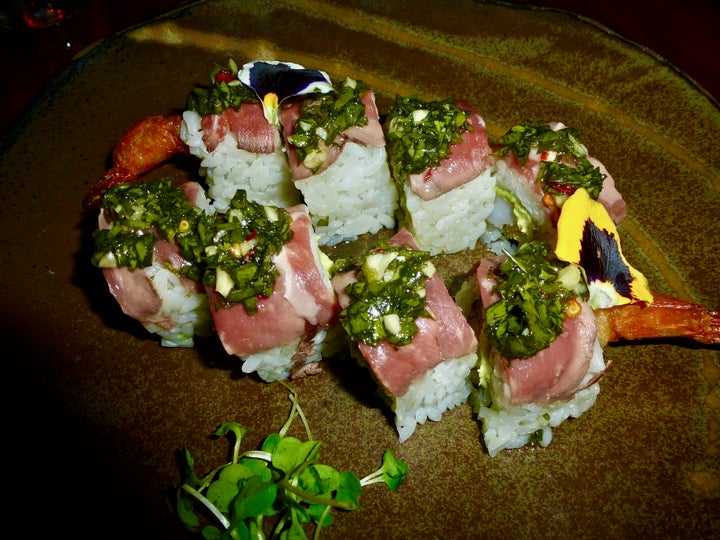 The Wagyu Beef Roll with crispy shrimp tempura, avocado, shibazuke and chimichurri soy. 