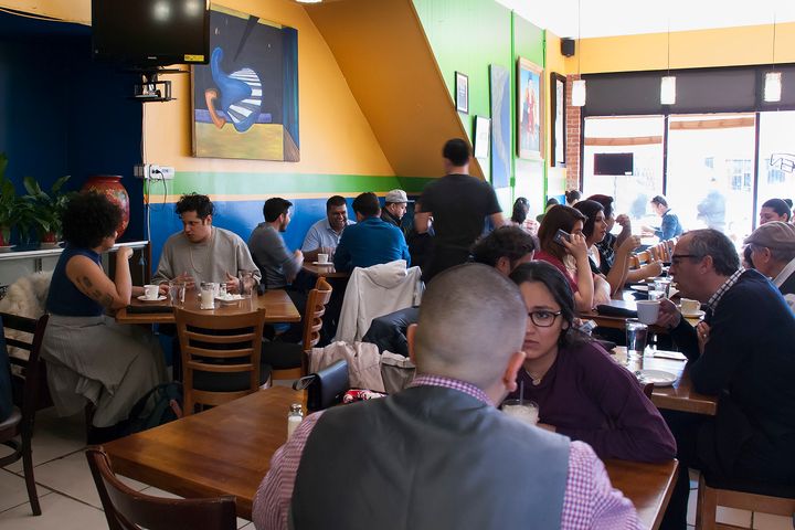 Customers enjoy their meals during lunch hour at 5 Rabanitos Restaurant in Chicago’s Pilsen neighborhood (Elizabeth Vlahos - Feb. 26, 2017).