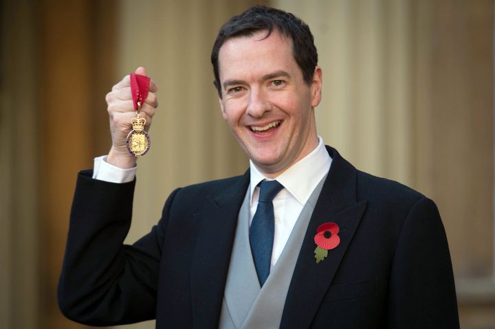 George Osborne picking up his Companion of Honour, in Cameron's final honours list