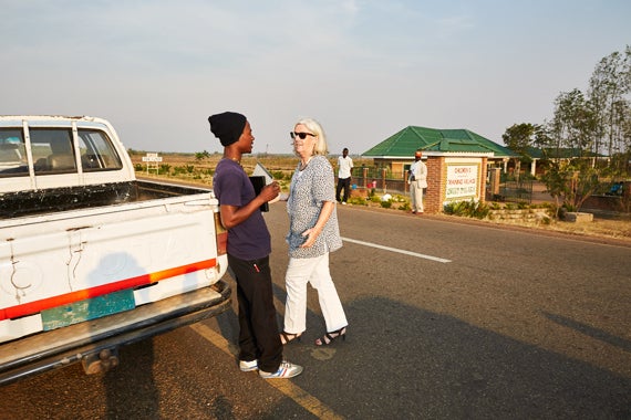 At the end of a long day, Margriet talks to Green Malata student Thomas, just before heading home. Blantyre, Malawi, 2016.