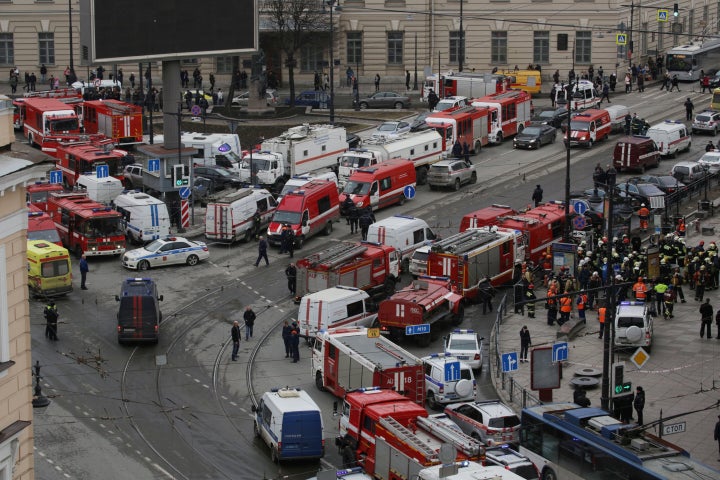 Dozens of emergency services vehicles gather outside the Russian train station