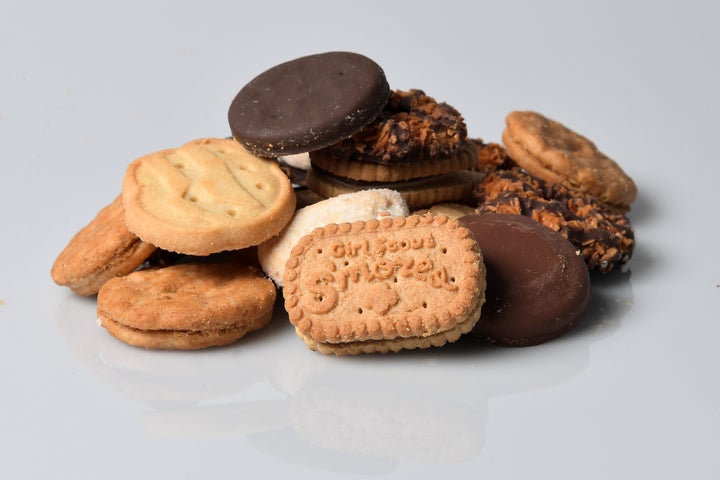 A cookie pile made up of beloved Girl Scout cookies.