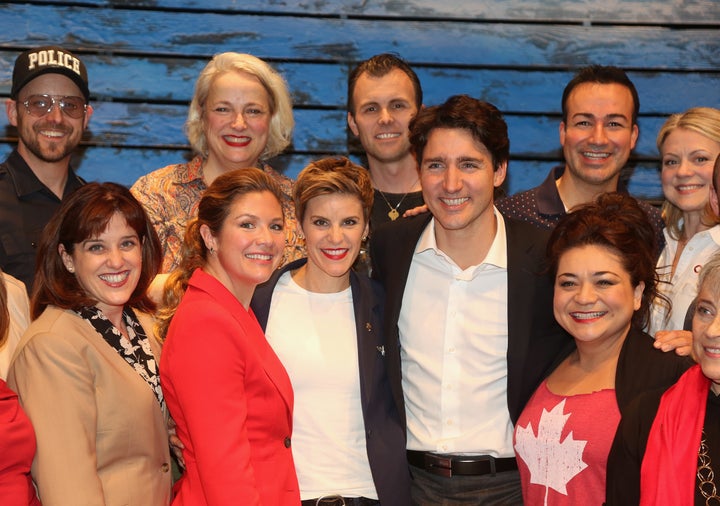 Canadian Prime Minister Justin Trudeau poses with the "Come From Away" cast. 