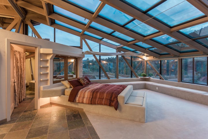 Bedrooms feature plenty of natural light thanks to glass ceilings. 