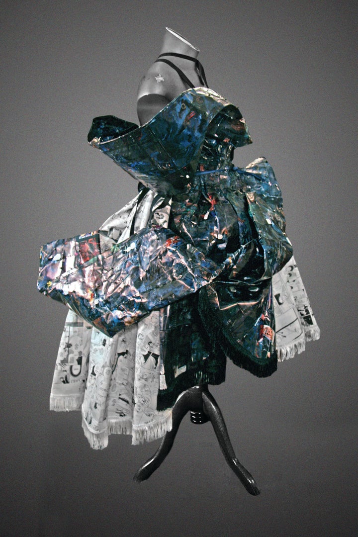<p>“ZAM!” paper dress made entirely out of the pages of recycled comic books for actress, Maisie Williams</p>