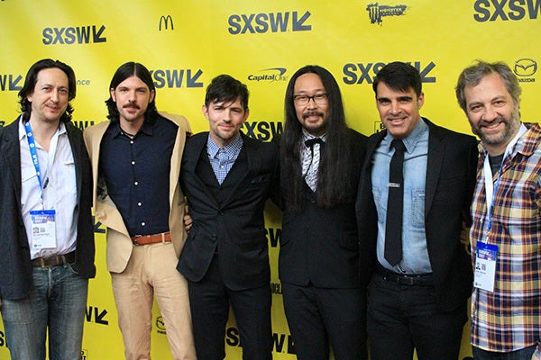 from left to right: Michael Bonfiglio, Seth Avett, Scott Avett, Joe Kwon, Bob Crawford, and Judd Apatow