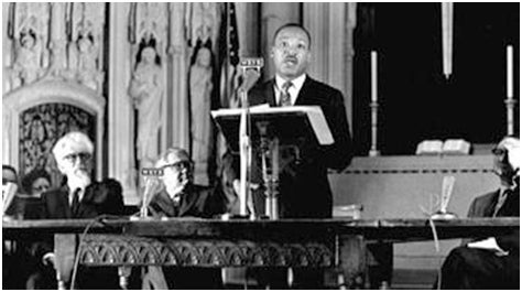 Martin Luther King speaking at Riverside Church, April 4, 1967. Rabbi Abraham Joshua Heschel is at left.