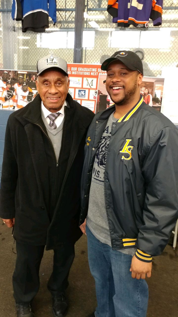 NHL legend, Willie O’Ree (left), with Laura Sims Skate House staff member, Terris Miller (right).