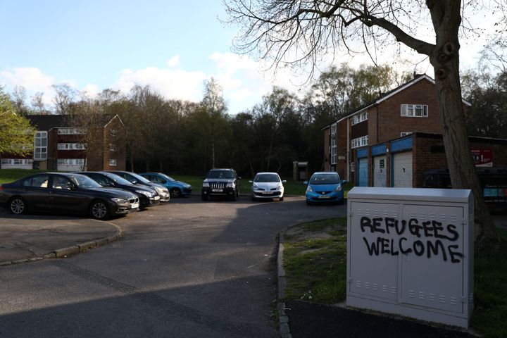 Graffiti daubed on a exchange box reads 'refugees welcome' after the horrific attack