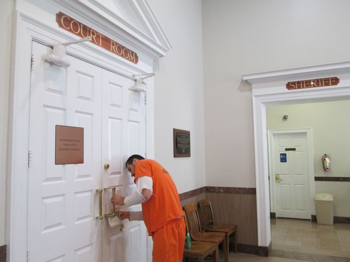 Travis Tyree, an inmate at the jail in Charlottesville, Virginia, has paid off more than $7,000 in court debt by doing community service at a local courthouse. Community service programs like the one he’s in offer people a way to pay court-imposed fines and fees.