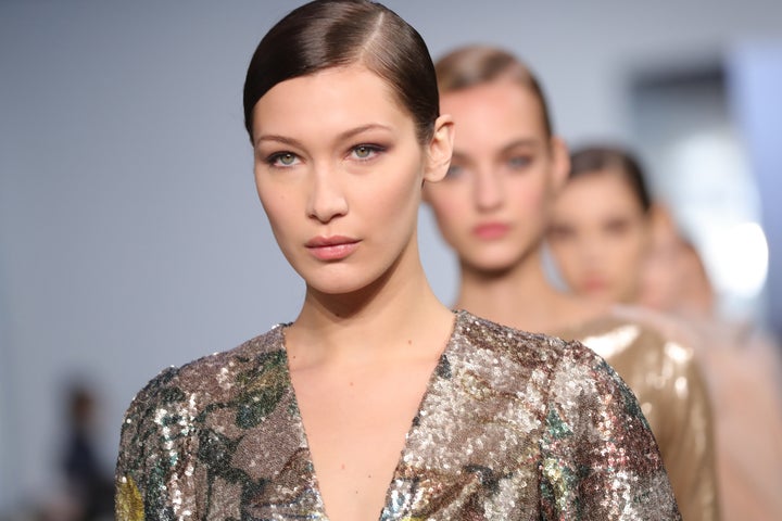 Bella Hadid walks the runway at Carolina Herrera during New York Fashion Week.