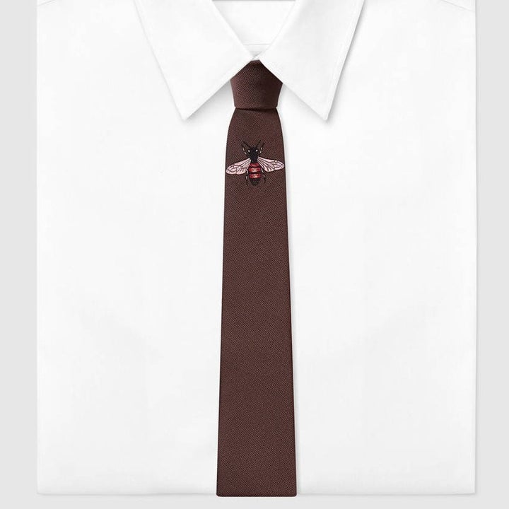 Gucci bee embroidered silk tie, $200, buy now at gucci.com