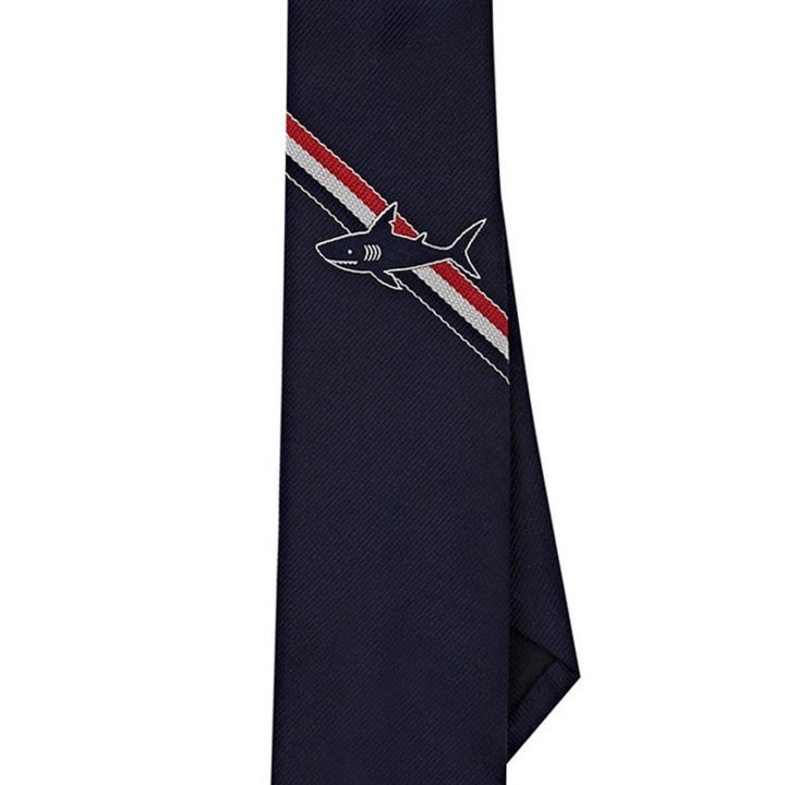 <p><em>Thom Browne embroidered silk stripe tie, $220, buy now at</em> <a rel="nofollow" href="http://www.barneys.com/product/thom-browne-shark-&-tricolor-stripe-silk-necktie-504961514.html" target="_blank">barneys.com</a></p>