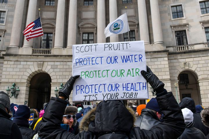 A protester has a message for Scott Pruitt as the American Federation of Government Employees and environmental groups rally outside the Environmental Protection Agency on March 15, 2017.