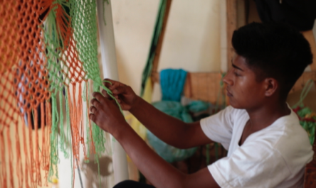 An employee weaves hammocks at the Centro Social Tio Antonio.