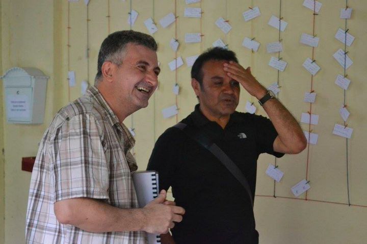 Antonio Prieto Buñuel, left, is the founder of Café de las Sonrisas, where all the employees are deaf.