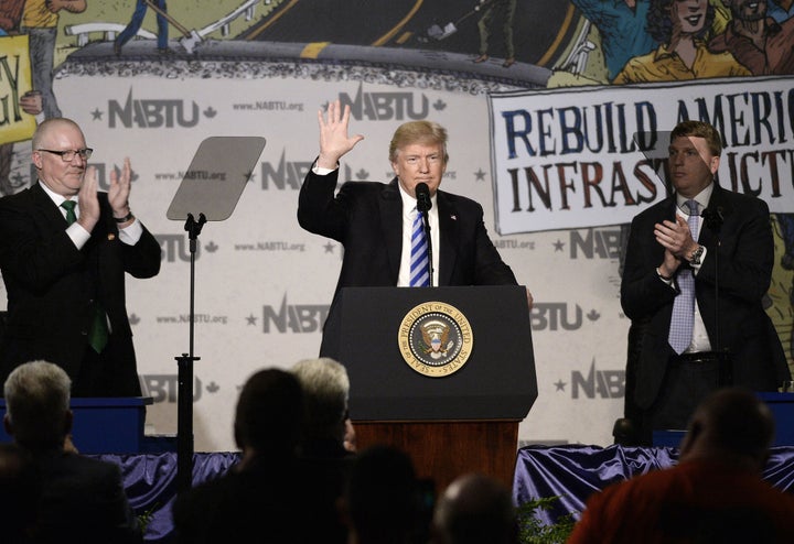 President Donald Trump speaks at the North America’s Building Trades Unions national conference at the Washington Hilton on Tuesday.