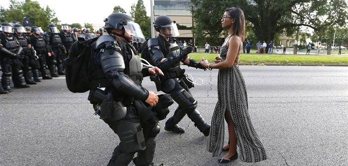 Black Lives Matter activist, Ieshia Evans, remaining calm while walking up to a line of riot police Baton Rouge, Louisiana.