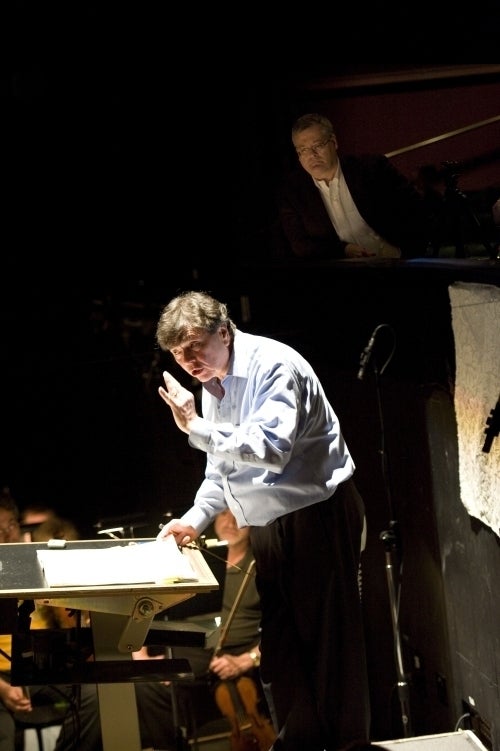 Daron Hagen observes as Gerard Schwarz rehearses his opera “Amelia” at Seattle Opera.