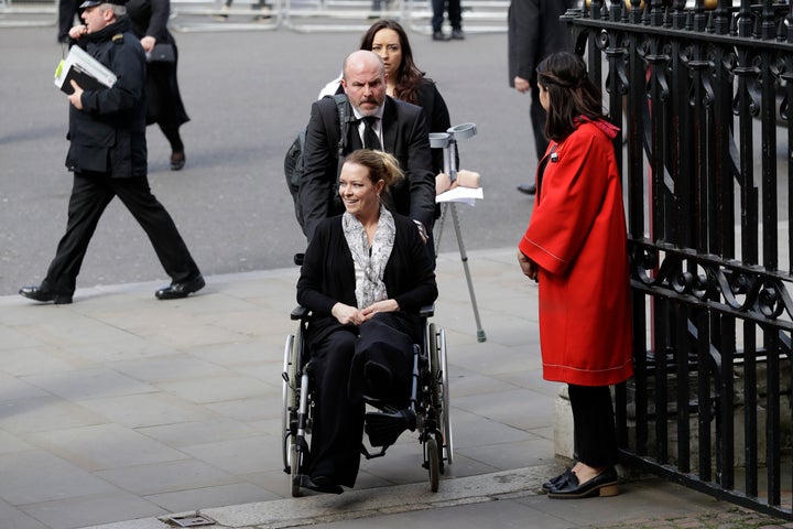 Injured US tourist Melissa Cochran, whose husband Kurt Cohran was killed in the attack, at the service