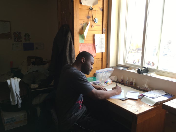 <p>Anthony Green writes a letter in his room at Gaudenzia, a drug and alcohol treatment center in Baltimore. Maryland is one of four states with federal permission to use Medicaid dollars to expand residential addiction treatment in response to the opioid epidemic.</p>