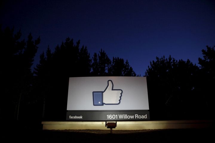 The sun rises behind the entrance sign to Facebook headquarters in 2012 in this file photo. Facebook announced a suite of new tools Wednesday to combat revenge porn on the site.