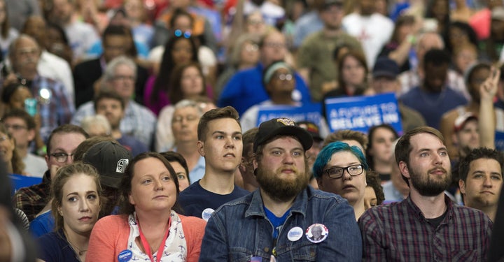 Attendees listen during an election night campaign event for Senator Bernie Sanders in Huntington, West Virginia on Tuesday,