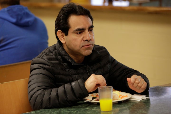 Roberto Beristain eats at a migrant shelter in Ciudad Juarez, Mexico on Wednesday.