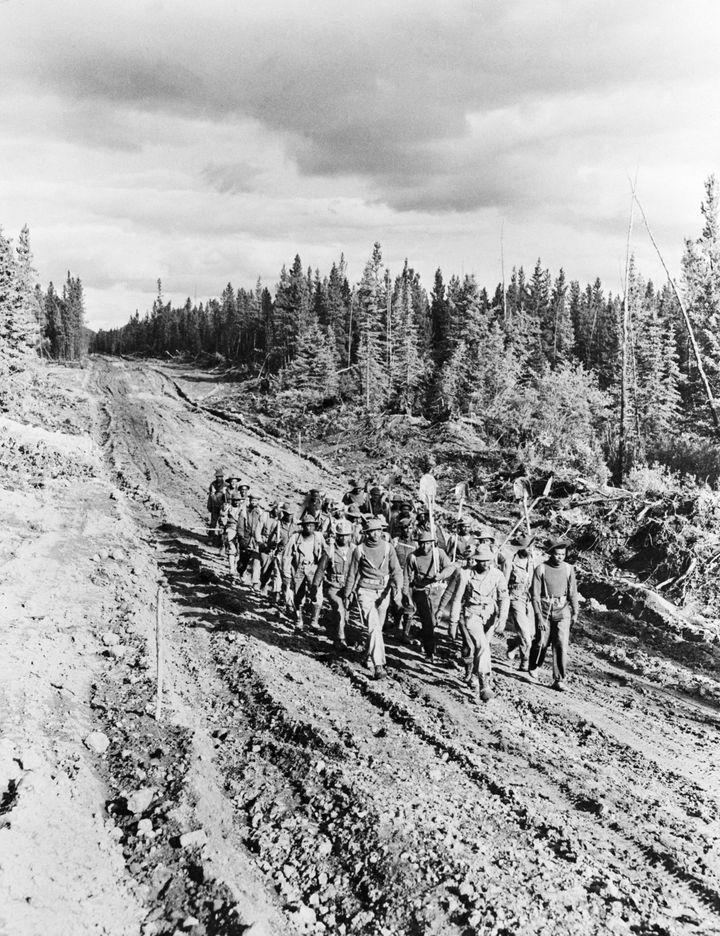 A photo from 1942 shows black soldiers working on the Alaska Highway. 