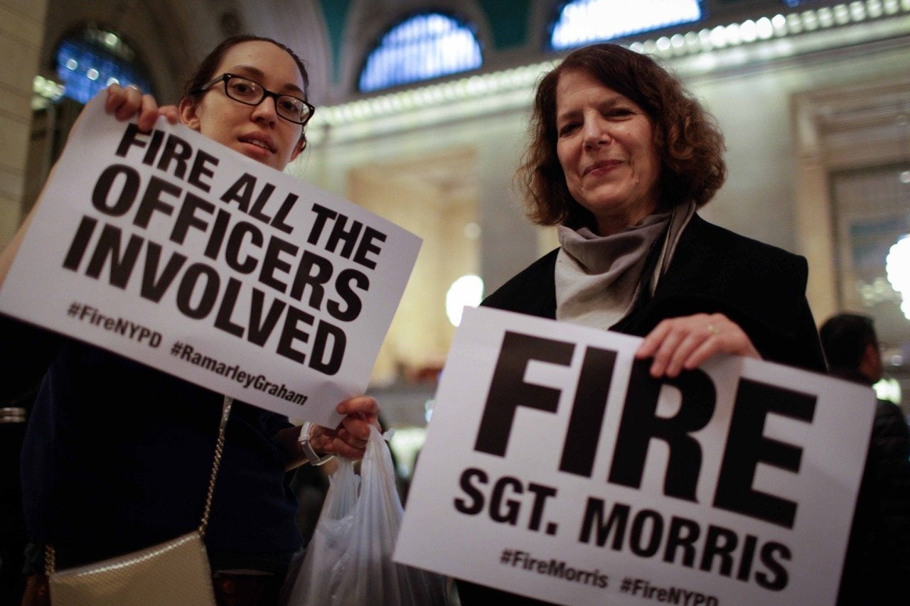 Protestors rally at Grand Central Station in New York City to demand justice for Ramarley Graham.