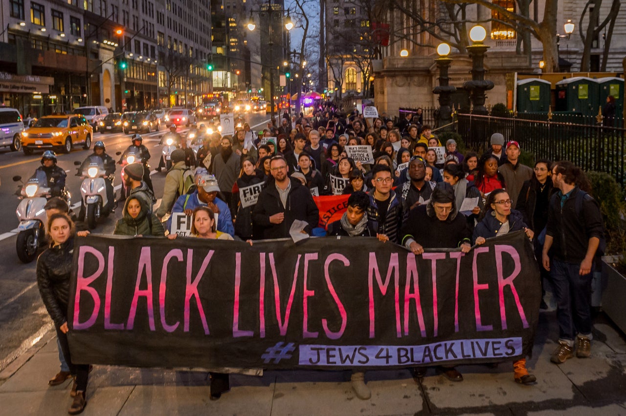 The protestors marched through midtown New York City.