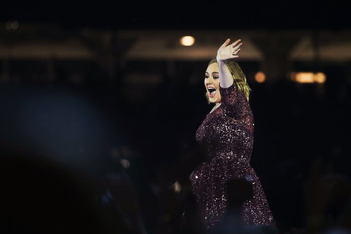 Adele waves to her adoring fans in Sydney.