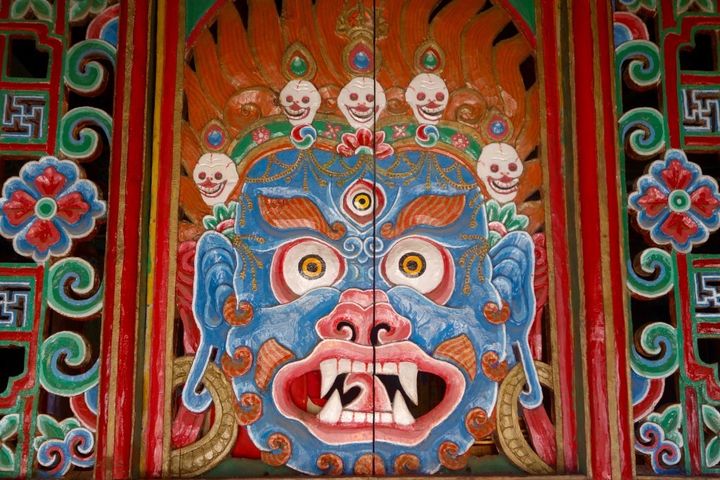 “You’ve angered the haircut gods!” Artwork on a Tibetan temple in Upper Mustang, Nepal.
