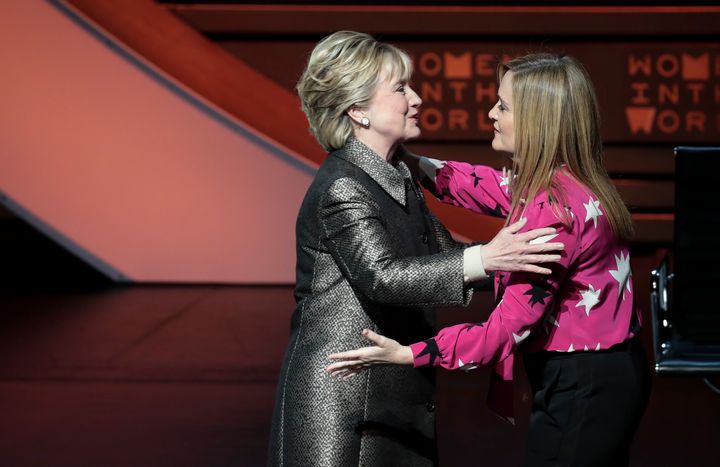 Former U.S. Secretary of State Hillary Clinton hugs Samantha Bee before an interview with Nicholas Kristof during the Women in the World Summit at Lincoln Center, April 6, 2017.