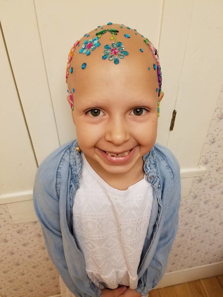 As "Crazy Hair Day" at Gianessa's school approached, Wride looked for a creative idea for her daughter. She found it in the form of jeweled scrapbooking stickers at Walmart.