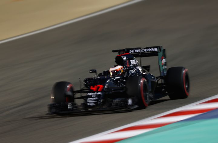 A McLaren-Honda Formula 1 car racing in Bahrain in 2016. 