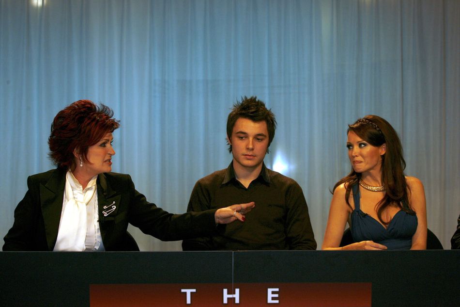 When Dannii Minogue was added to the &lsquo;X Factor&rsquo; judging panel in its fourth series, Sharon Osbourne was suitably unimpressed. She was able to mask it well enough at first, but by the end of the series, she was running around the &lsquo;Graham Norton Show&rsquo; studio, doing an unflattering impression of the Australian judge, making fun of her Botox and eventually comparing Dannii&rsquo;s face to her own bum.Charming.Dannii never retaliated until years later, when she detailed Mrs O&rsquo;s treatment of her in her autobiography, with Kelly Osbourne wading in on Twitter and branding the &lsquo;Put The Needle On It&rsquo; singer &ldquo;the devil&rdquo;.Literally. &ldquo;The devil&rdquo;. That&rsquo;s what someone said about Dannii Minogue.