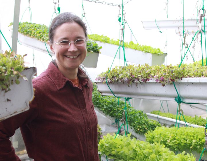Clare Hinz inside the greenhouse of her farm in Herbster, Wisconsin. 