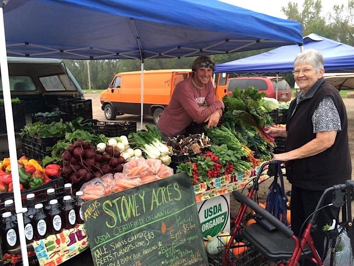 Tony Schultz of Stoney Acres Farm at a farmers market near Athens, Wisconsin. 