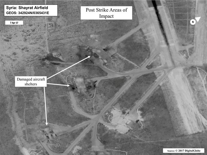 Battle damage assessment image of Shayrat Airfield, Syria, is seen in this DigitalGlobe satellite image, released by the Pentagon following U.S. Tomahawk Land Attack Missile strikes from Arleigh Burke-class guided-missile destroyers, the USS Ross and USS Porter on April 7, 2017.
