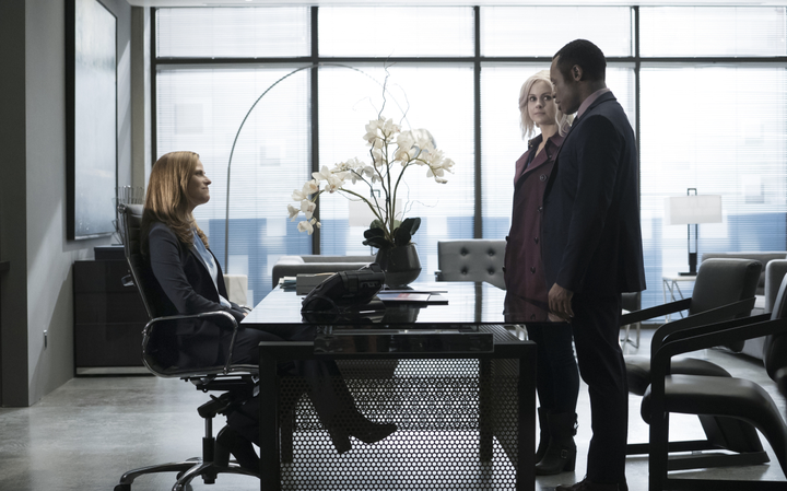 Liv (Rose McIver) and Clive (Malcolm Goodwin) meet with the CEO of the pro-zombie organization. 