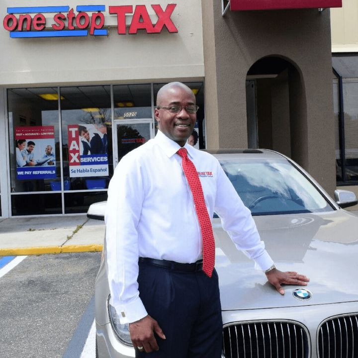 Gregory Grant standing outside of One Stop Tax Jacksonville. 