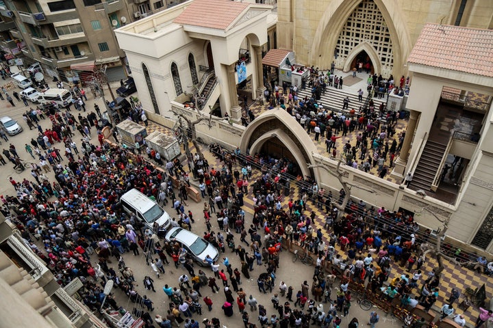 People gather in front of the Saint George church after a bombing struck inside the church in the Nile Delta city of Tanta, Egypt on April 9, 2017. (Photo by Ibrahim Ramadan/Anadolu Agency/Getty Images)