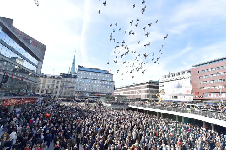 Thousands of people packed Stockholm's center square in a "Lovefest" vigil against terrorism on Sunday.