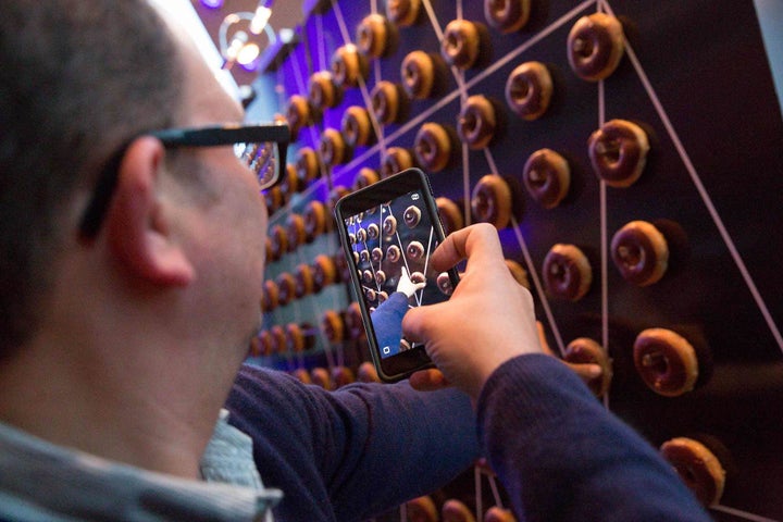 <p>Instagramming the donut walls.</p>